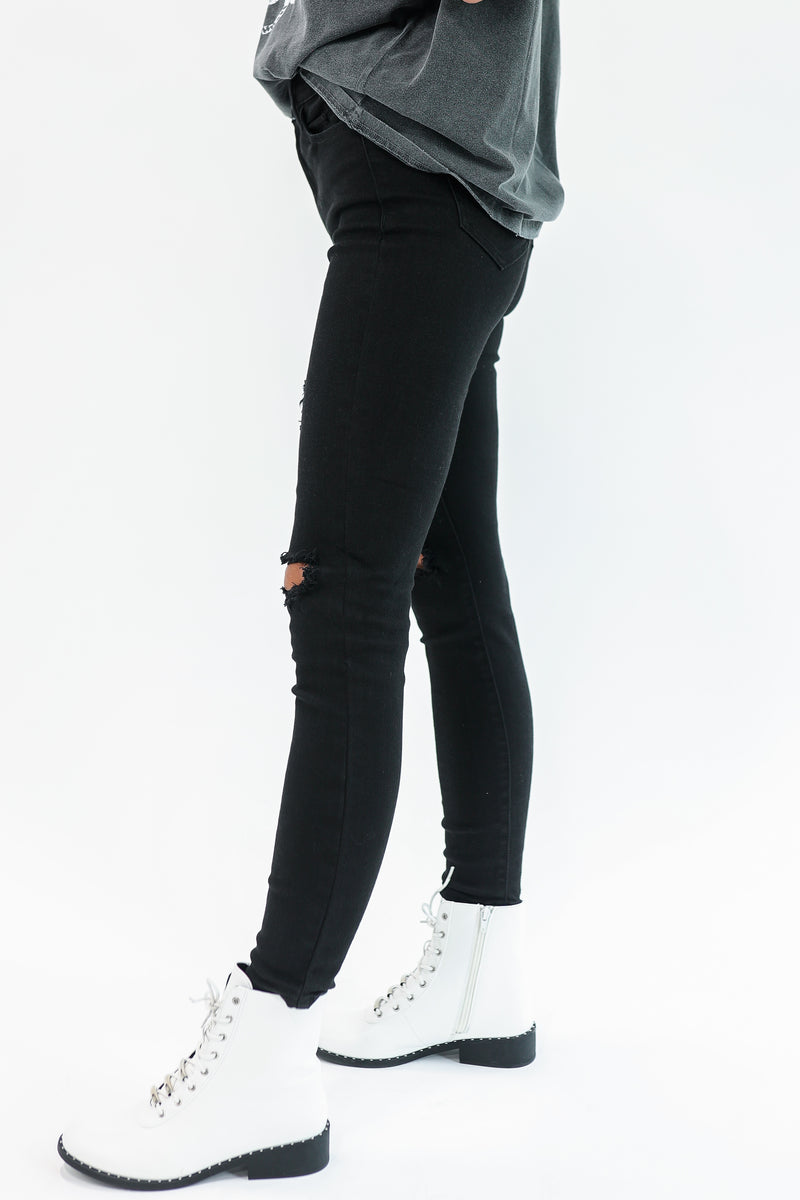 The Paige Distressed Skinny In Black