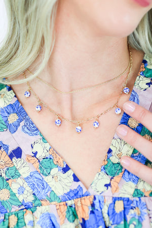 Kinder Than Most Charm Necklace In Blue