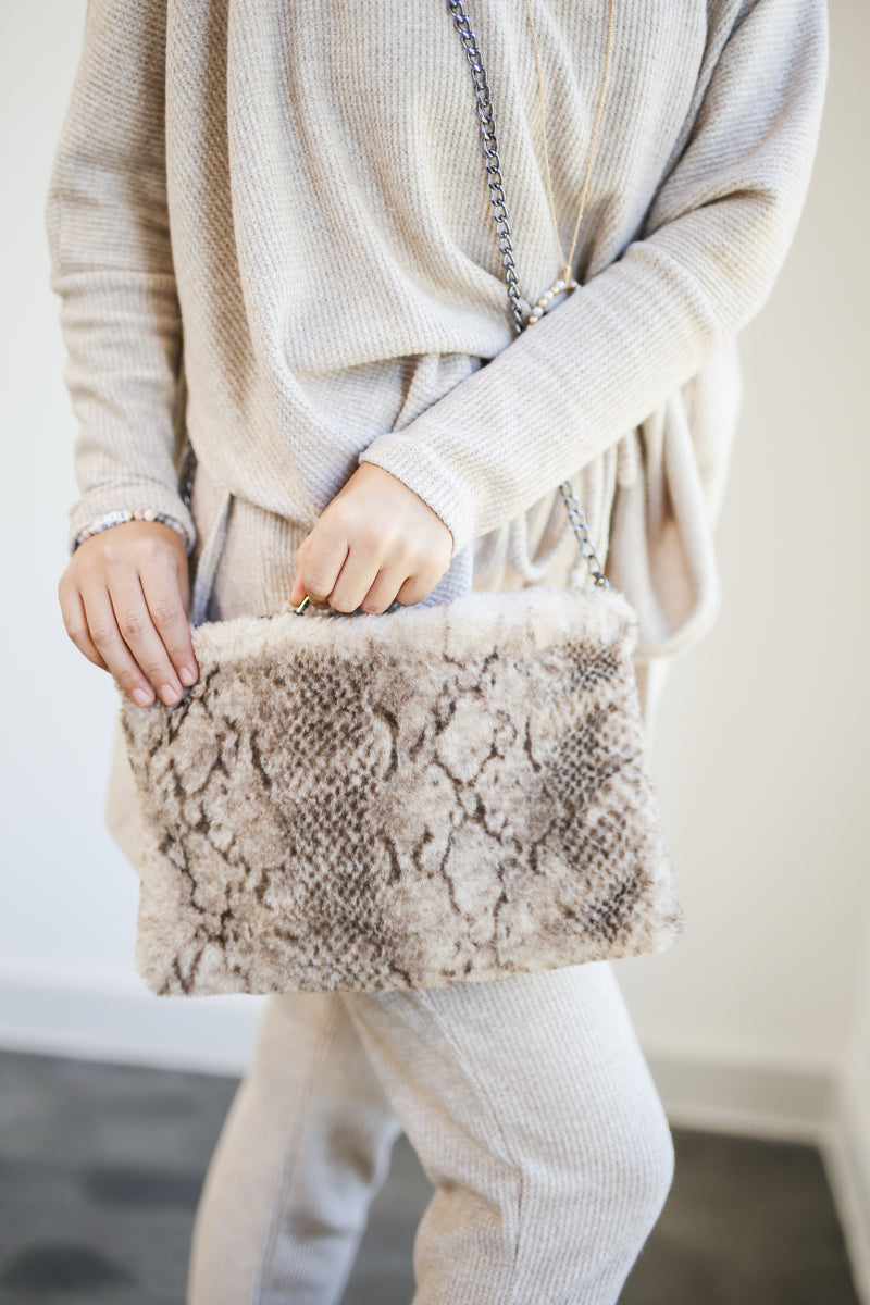 To The Alps Faux Fur Snake Print Clutch