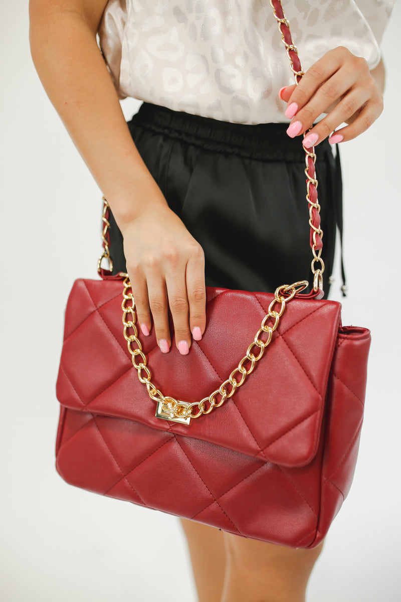 The Blair Quilted Handbag In Cranberry